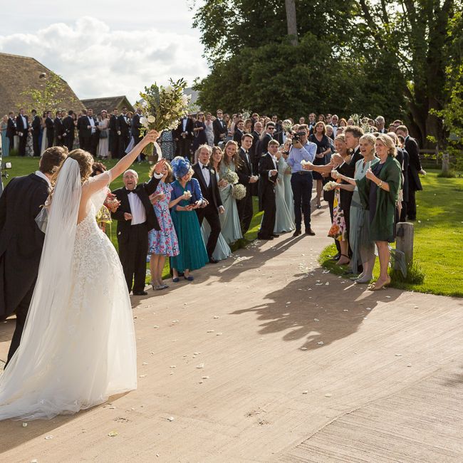 Bride in Mira Zwillinger Bridal Gown | Rustic Soho Farmhouse Ceremony with PapaKata Sperry Tent Greenery filled Reception | Marianne Taylor Photography | Will Warr Films