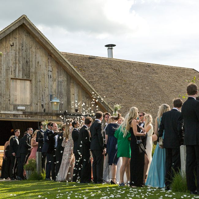 Confetti Moment | Bride in Mira Zwillinger Bridal Gown | Rustic Soho Farmhouse Ceremony with PapaKata Sperry Tent Greenery filled Reception | Marianne Taylor Photography | Will Warr Films