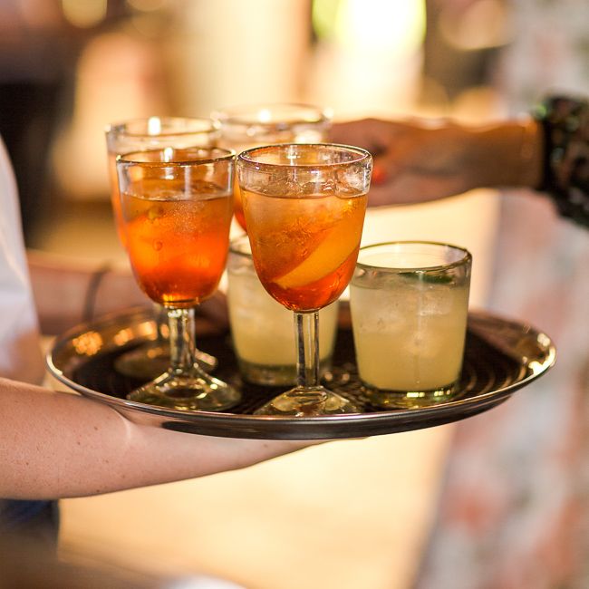 Drinks Reception | Rustic Soho Farmhouse Ceremony with PapaKata Sperry Tent Greenery filled Reception | Marianne Taylor Photography | Will Warr Films