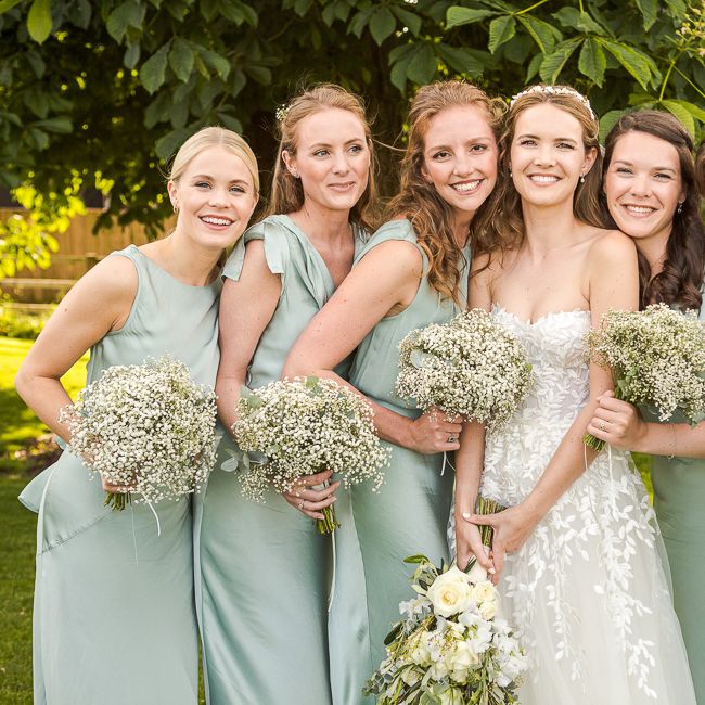 Bride in Mira Zwillinger Bridal Gown | Pale Green Ghost Bridesmaid Dresses | Rustic Soho Farmhouse Ceremony with PapaKata Sperry Tent Greenery filled Reception | Marianne Taylor Photography | Will Warr Films