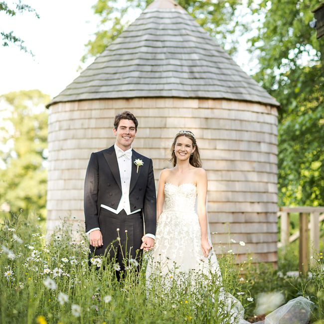 Bride in Mira Zwillinger Bridal Gown | Groom in Black Tie | Rustic Soho Farmhouse Ceremony with PapaKata Sperry Tent Greenery filled Reception | Marianne Taylor Photography | Will Warr Films