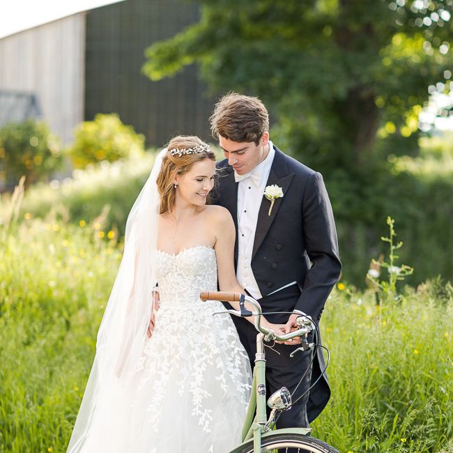 Bride in Mira Zwillinger Bridal Gown | Groom in Black Tie | Rustic Soho Farmhouse Ceremony with PapaKata Sperry Tent Greenery filled Reception | Marianne Taylor Photography | Will Warr Films
