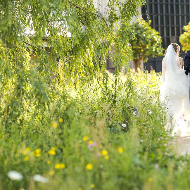 Bride in Mira Zwillinger Bridal Gown | Groom in Black Tie | Rustic Soho Farmhouse Ceremony with PapaKata Sperry Tent Greenery filled Reception | Marianne Taylor Photography | Will Warr Films