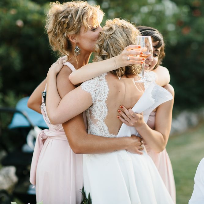 Bride & Bridesmaids Embrace