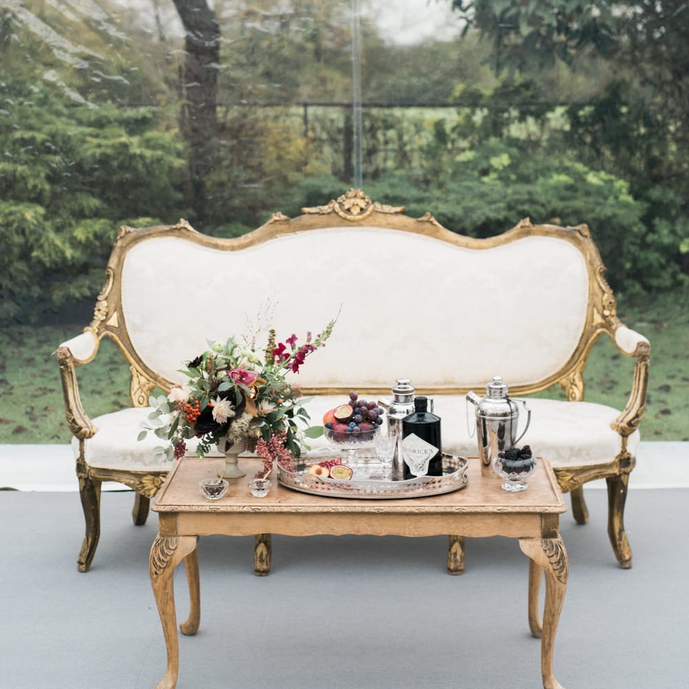 Elegant Sofa & Cocktail Area | Autumnal Decadence Wedding Inspiration at Twyning Park Styled by For The Love of Weddings | Red, Gold & Blush Colour Scheme | Captured by Katrina Photography