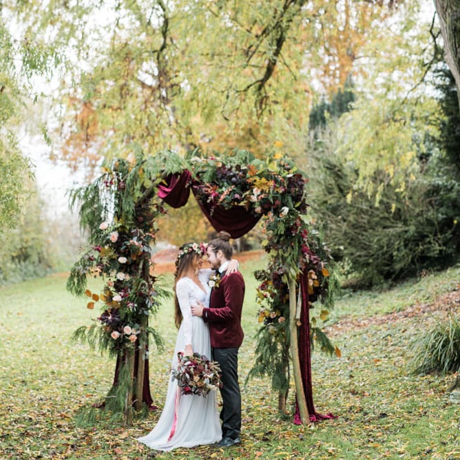 Woodland Floral Arch | Stylish Bride & Groom | Autumnal Decadence Wedding Inspiration at Twyning Park Styled by For The Love of Weddings | Red, Gold & Blush Colour Scheme | Captured by Katrina Photography