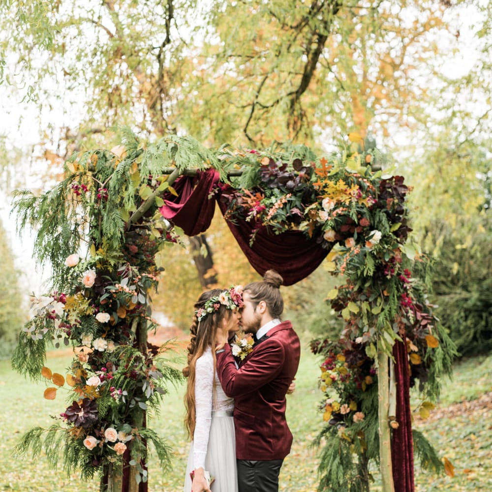 Woodland Floral Arch | Stylish Bride & Groom | Autumnal Decadence Wedding Inspiration at Twyning Park Styled by For The Love of Weddings | Red, Gold & Blush Colour Scheme | Captured by Katrina Photography
