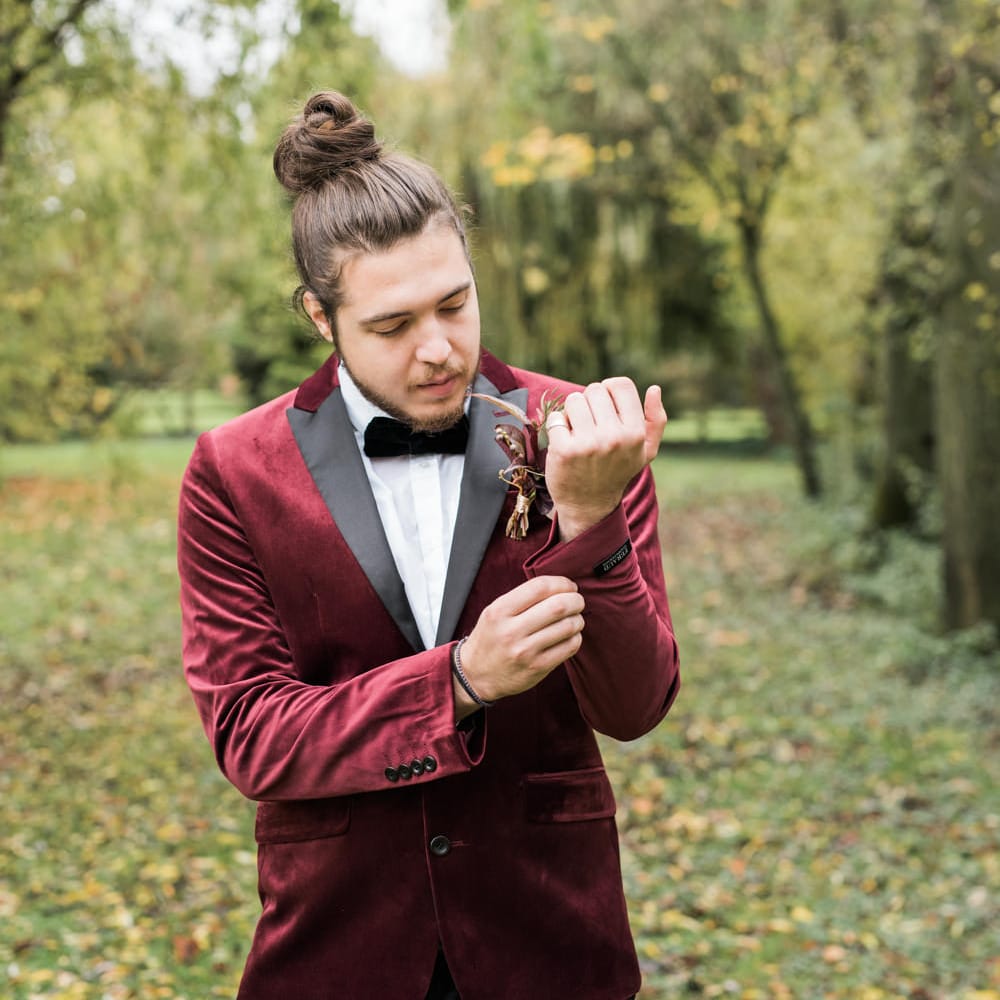 Groom in Red Velvet Lounge Jacket | Autumnal Decadence Wedding Inspiration at Twyning Park Styled by For The Love of Weddings | Red, Gold & Blush Colour Scheme | Captured by Katrina Photography