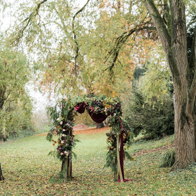 Autumn Floral Arch | Autumnal Decadence Wedding Inspiration at Twyning Park Styled by For The Love of Weddings | Red, Gold & Blush Colour Scheme | Captured by Katrina Photography
