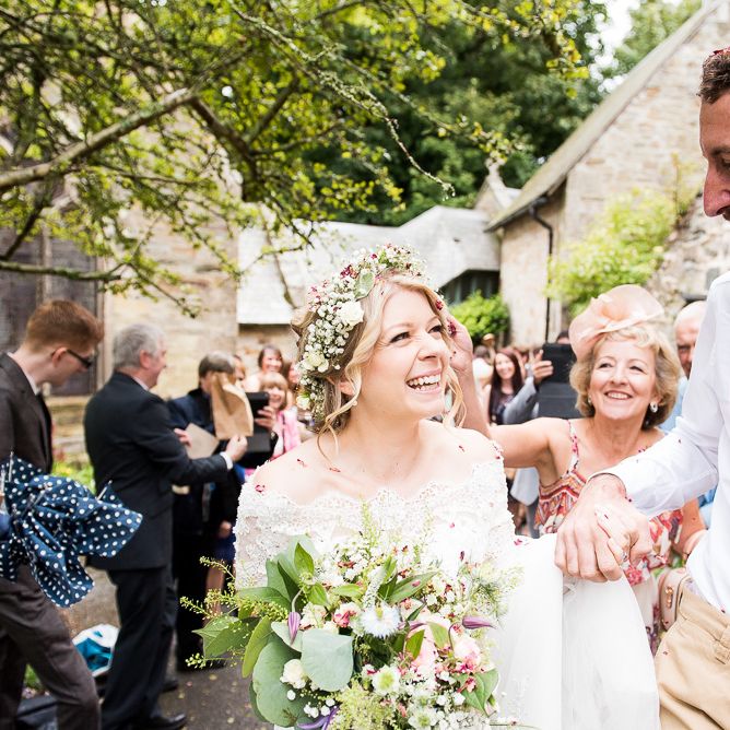 Confetti Moment | Bride in Lace Wedding Dress | Groom in Shorts, Braces & Bow Tie | Coastal Wedding at Driftwood Spas St Agnes, Cornwall | Jessica Grace Photography