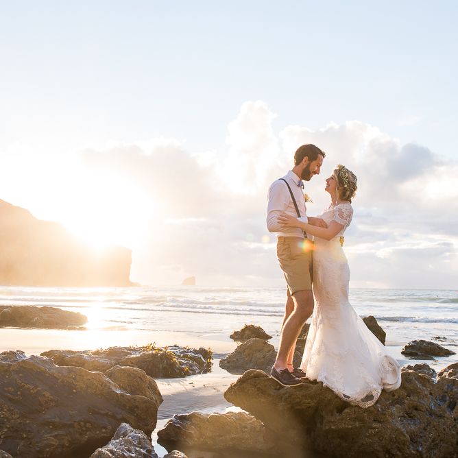 Golden Hour | Bride in Lace Wedding Dress | Groom in Shorts, Braces & Bow Tie | Coastal Wedding at Driftwood Spas St Agnes, Cornwall | Jessica Grace Photography