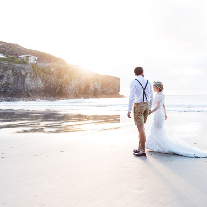 Golden Hour | Bride in Lace Wedding Dress | Groom in Shorts, Braces & Bow Tie | Coastal Wedding at Driftwood Spas St Agnes, Cornwall | Jessica Grace Photography