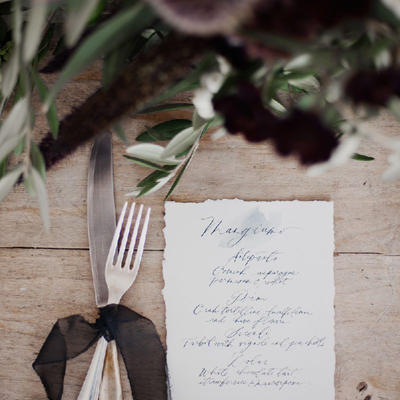 Elegant Place Setting With Plum Coloured Ribbon
