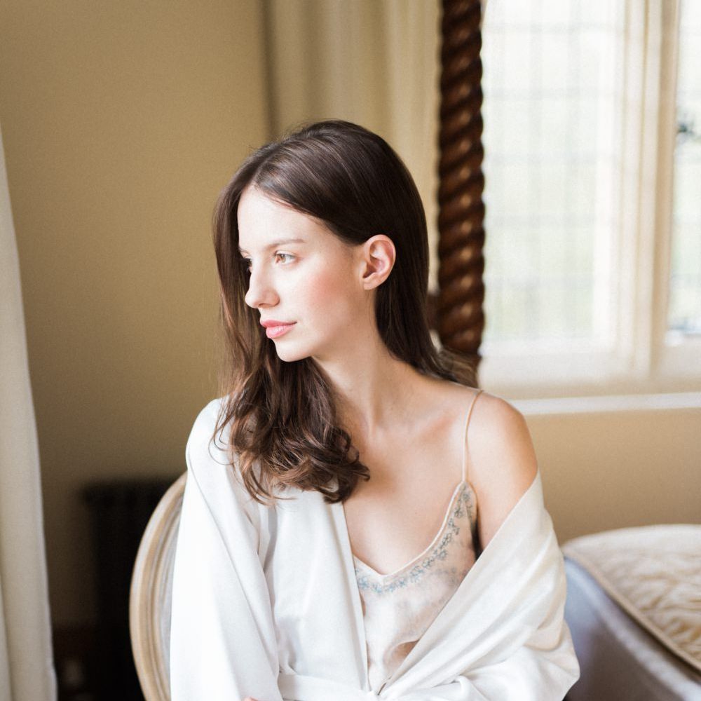 Bride Getting Ready | Romantic Blush Wedding Inspiration by The Wedding Stylist at Notley Abbey with Joanna Truby Flowers | Emma Pilkington Photography | Opaline Films