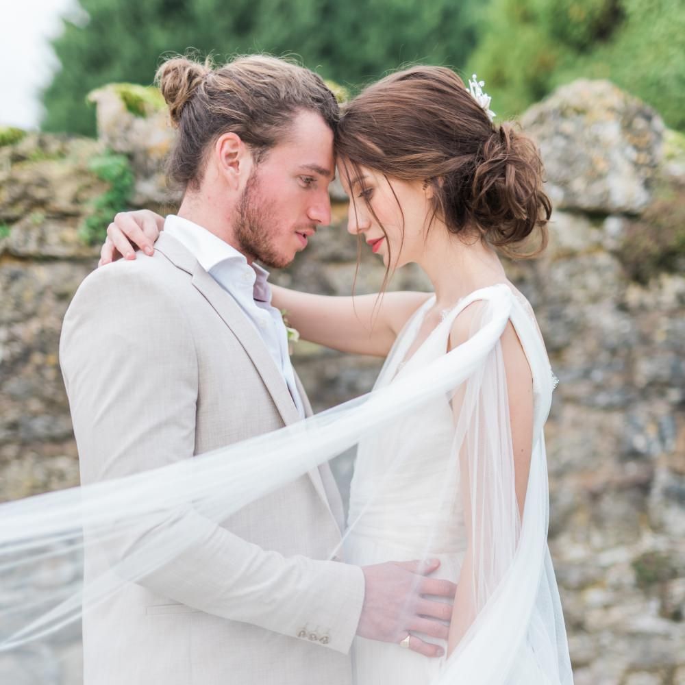 Bride in Cherry Williams Gown | Groom in Beige Suit | Romantic Blush Wedding Inspiration by The Wedding Stylist at Notley Abbey with Joanna Truby Flowers | Emma Pilkington Photography | Opaline Films