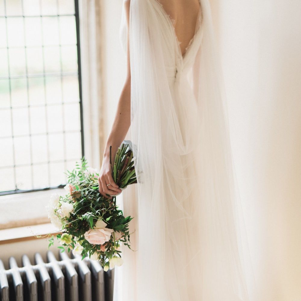Bride in Cherry Williams Gown | Romantic Blush Wedding Inspiration by The Wedding Stylist at Notley Abbey with Joanna Truby Flowers | Emma Pilkington Photography | Opaline Films
