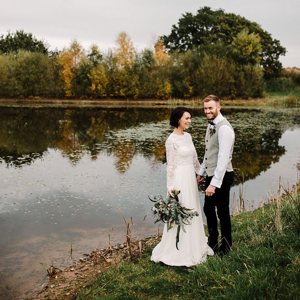Boho Bride in Shikoba Bride Wedding Dress | Groom in Kaye Hannabuss Textiles Grey Waitcoat | Boho Winter Tipi Wedding Inspiration | Styling & Concept by Pretty Creative | Amy Faith Photography