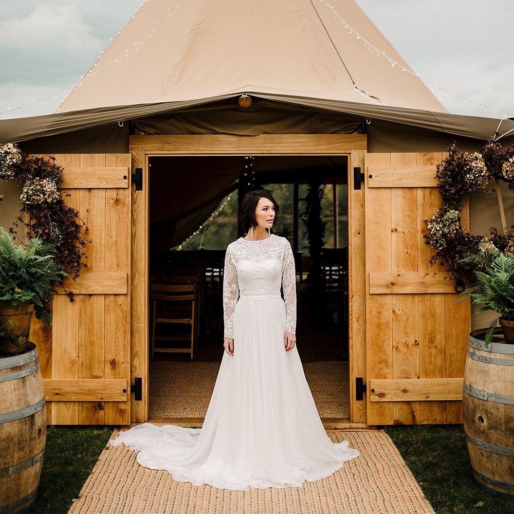Tipi by All About Me Marquees | Boho Bride in Shikoba Bride Wedding Dress | Boho Winter Tipi Wedding Inspiration | Styling & Concept by Pretty Creative | Amy Faith Photography