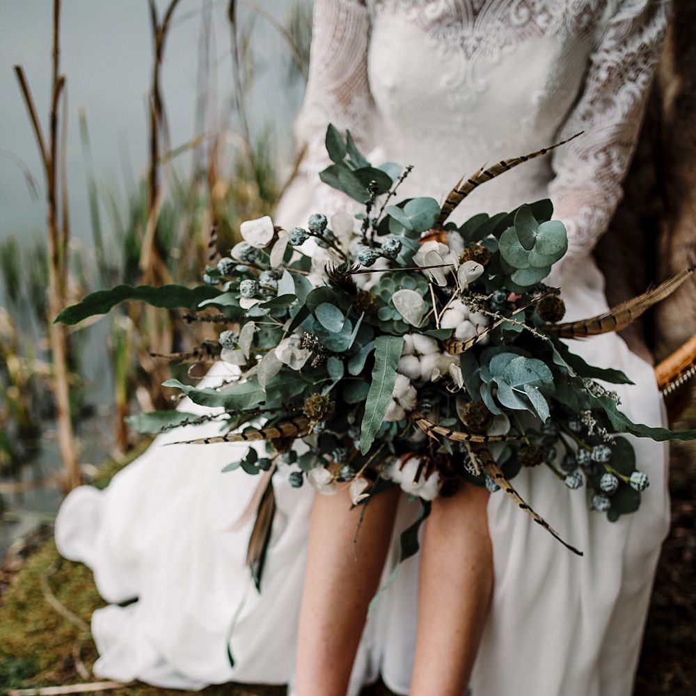 Winter Bouquet | Eucalyptus | Succulents | Pheasant Feather | Boho Bride in Shikoba Bride Wedding Dress | Boho Winter Tipi Wedding Inspiration | Styling & Concept by Pretty Creative | Amy Faith Photography