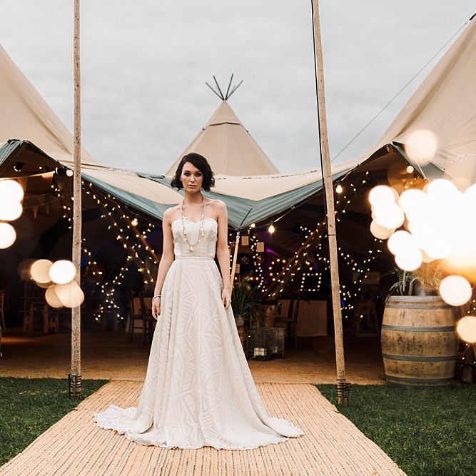 Tipi by All About Me Marquees | Boho Bride in Shikoba Bride Wedding Dress | Boho Winter Tipi Wedding Inspiration | Styling & Concept by Pretty Creative | Amy Faith Photography