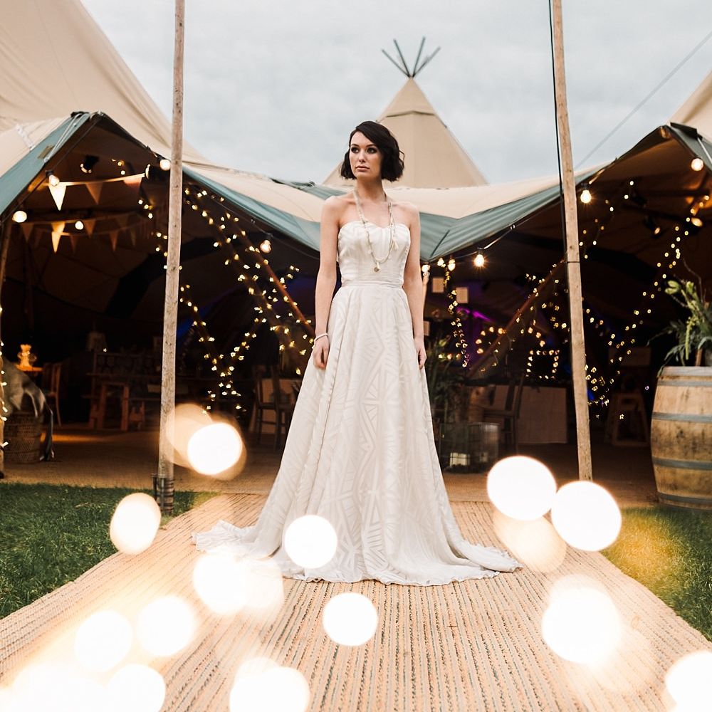 Tipi by All About Me Marquees | Boho Bride in Shikoba Bride Wedding Dress | Boho Winter Tipi Wedding Inspiration | Styling & Concept by Pretty Creative | Amy Faith Photography