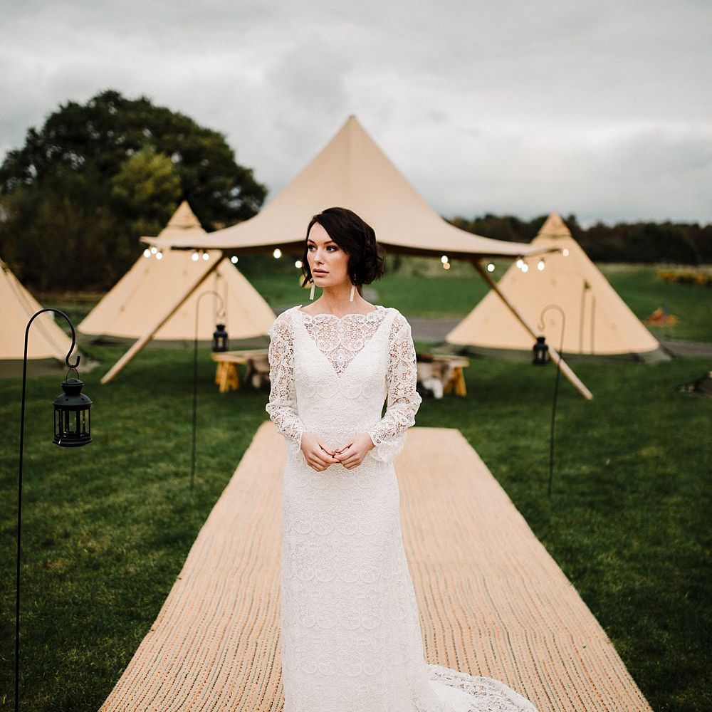 Tipi by All About Me Marquees | Boho Bride in Shikoba Bride Wedding Dress | Boho Winter Tipi Wedding Inspiration | Styling & Concept by Pretty Creative | Amy Faith Photography
