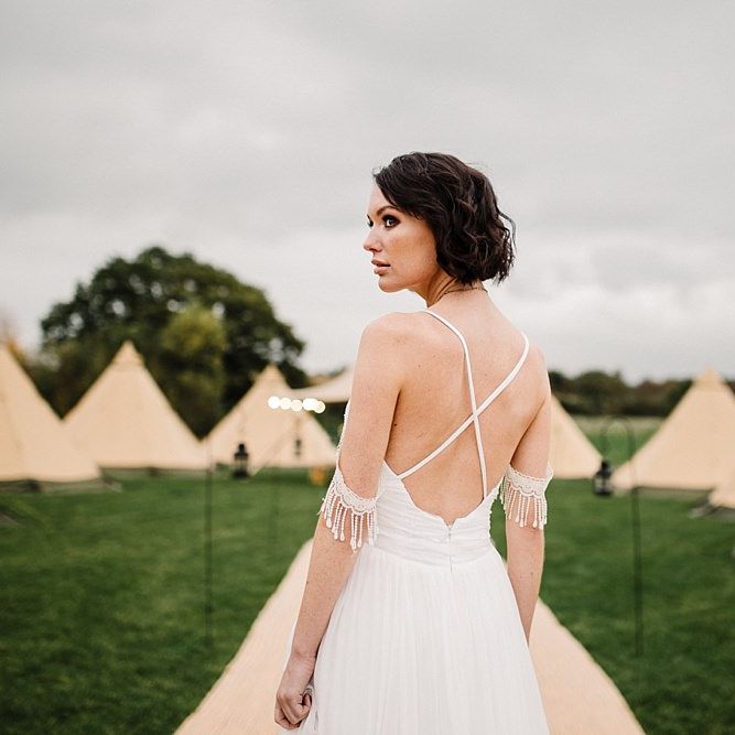 Tipi by All About Me Marquees | Boho Bride in Shikoba Bride Wedding Dress | Boho Winter Tipi Wedding Inspiration | Styling & Concept by Pretty Creative | Amy Faith Photography