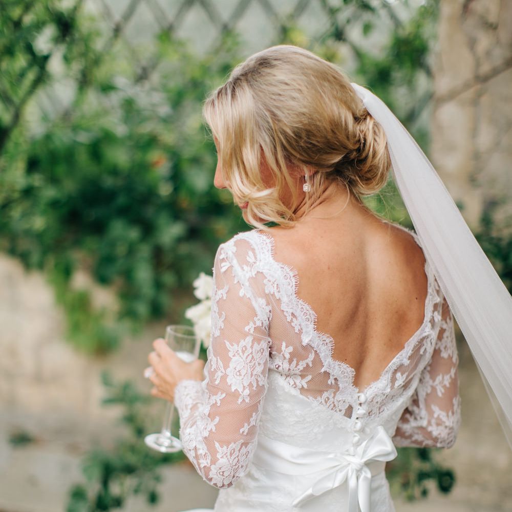 Bride in Suzanne Neville Victoriana Wedding Dress