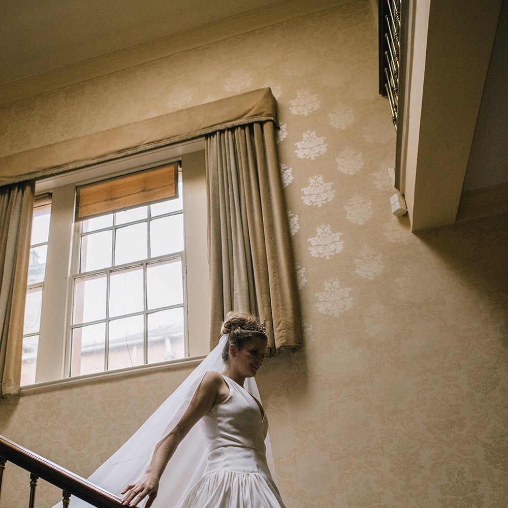 Bride in Dee Hutton Wedding Dress | Classic Blue & White Wedding at Prestwold Hall in Loughborough | Georgina Harrison Photography