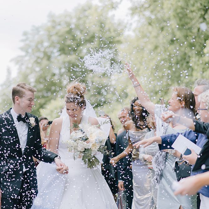 Confetti Moment | Bride in Dee Hutton Gown | Groom in Tuxedo | Classic Blue & White Wedding at Prestwold Hall in Loughborough | Georgina Harrison Photography