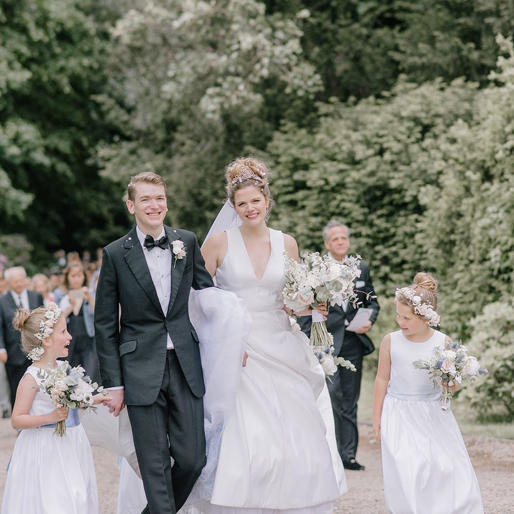 Bride, Groom & Flower Girls | Classic Blue & White Wedding at Prestwold Hall in Loughborough | Georgina Harrison Photography