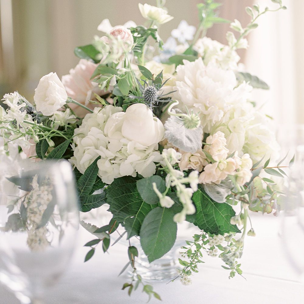 Floral Centrepiece | Classic Blue & White Wedding at Prestwold Hall in Loughborough | Georgina Harrison Photography