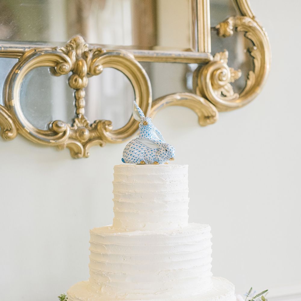 Elegant White Wedding Cake with Floral Skirt | Classic Blue & White Wedding at Prestwold Hall in Loughborough | Georgina Harrison Photography