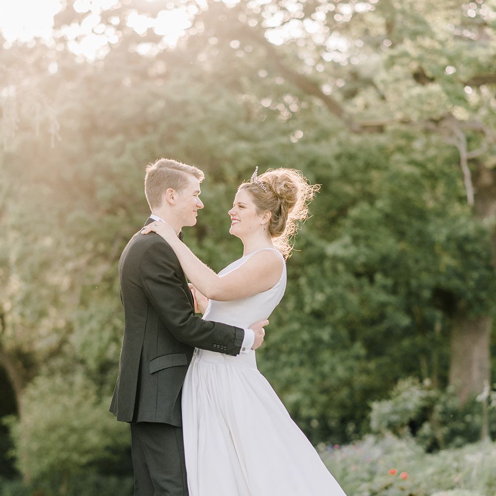 Bride in Dee Hutton Wedding Dress | Groom in Black Tuxedo | Classic Blue & White Wedding at Prestwold Hall in Loughborough | Georgina Harrison Photography