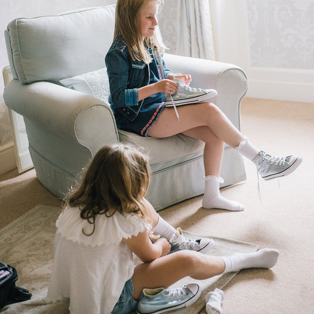 Flower Girls with Blue Converse | Classic Blue & White Wedding at Prestwold Hall in Loughborough | Georgina Harrison Photography