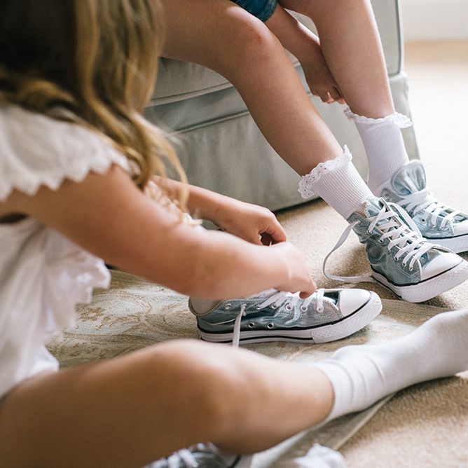 Flower Girls with Blue Converse Trainers | Classic Blue & White Wedding at Prestwold Hall in Loughborough | Georgina Harrison Photography