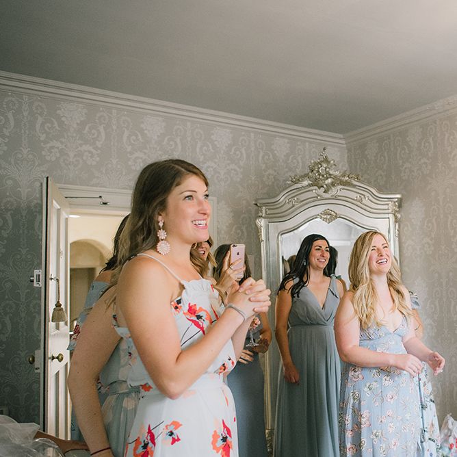 Bridesmaids in Different Coloured Pale Blue Dresses | Classic Blue & White Wedding at Prestwold Hall in Loughborough | Georgina Harrison Photography