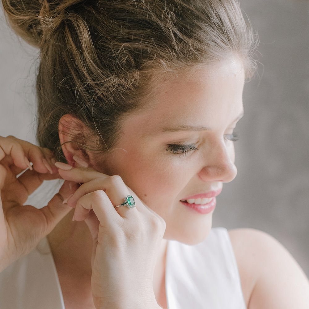 Bride with Emerald Ring | Classic Blue & White Wedding at Prestwold Hall in Loughborough | Georgina Harrison Photography