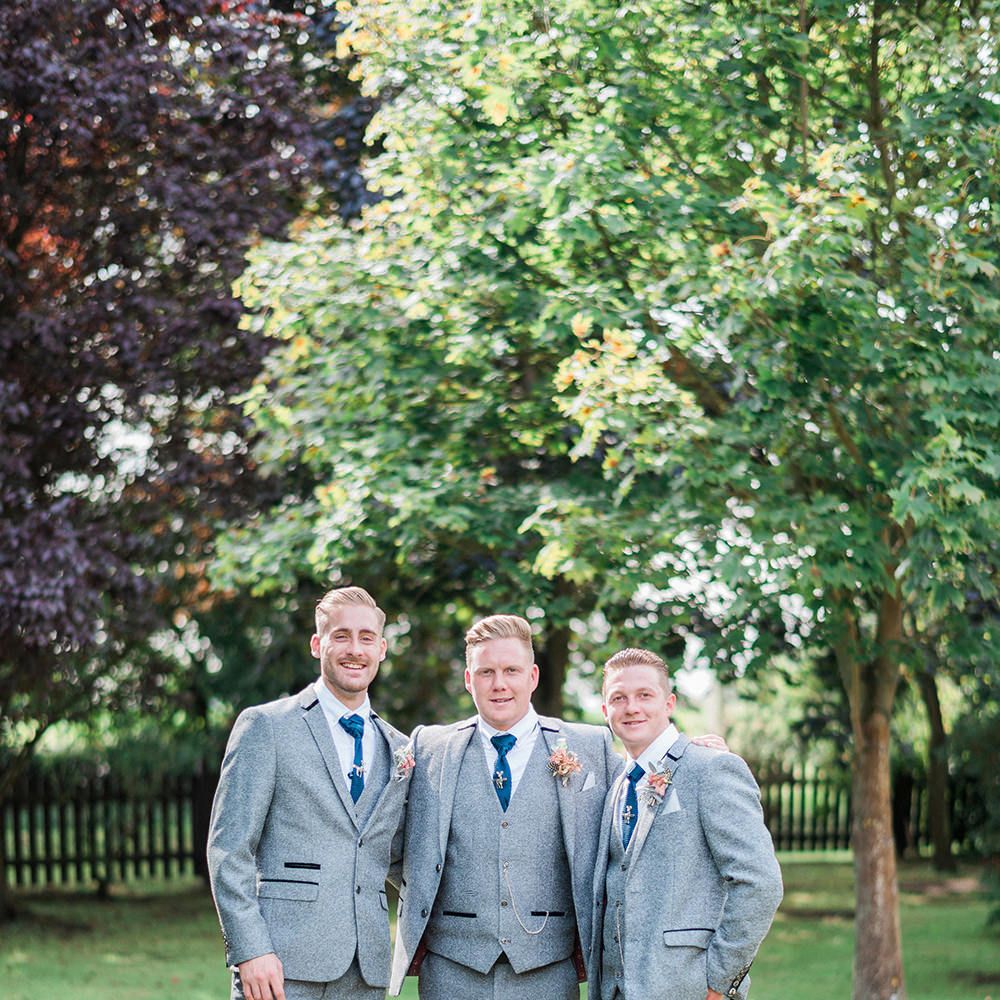 Groomsmen in Grey Wool Master Debonair Suits & Navy Ties | Pink & Coral Country Wedding at Crabbs Barn, Essex | Kathryn Hopkins Photography | Film by Colbridge Media Services Ltd