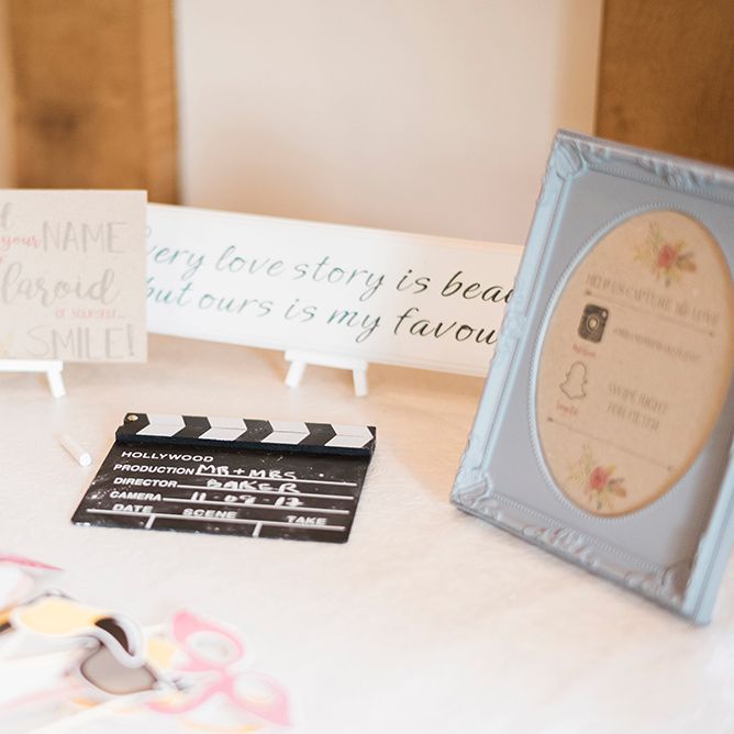 Polaroid Picture Guest Book Station | Romantic Peach & Coral Floral Centrepiece | Peach & Coral Country Wedding at Crabbs Barn, Essex | Kathryn Hopkins Photography | Film by Colbridge Media Services Ltd