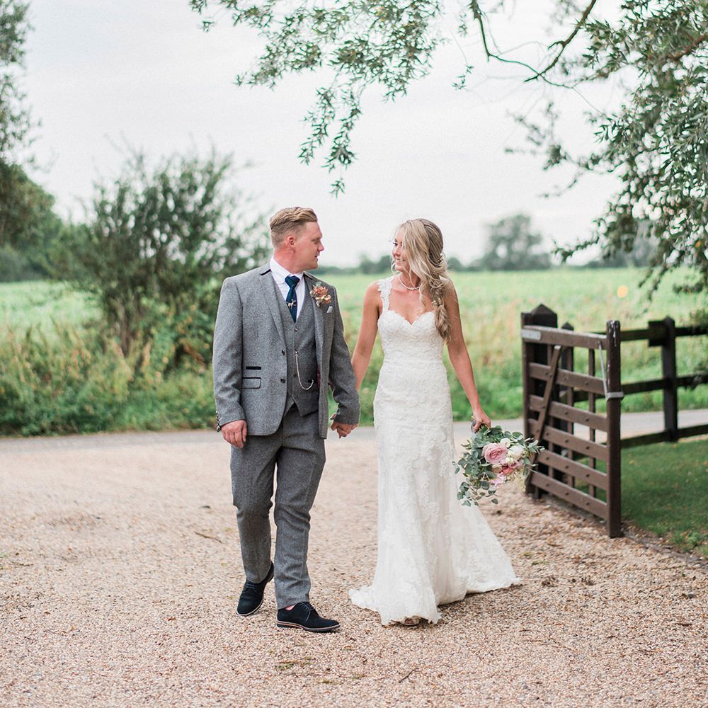 Bride in Lace Enzoani 'Inaru' Bridal Gown | Groom in Grey Wool Master Debonair Suit | Peach & Coral Country Wedding at Crabbs Barn, Essex | Kathryn Hopkins Photography | Film by Colbridge Media Services Ltd