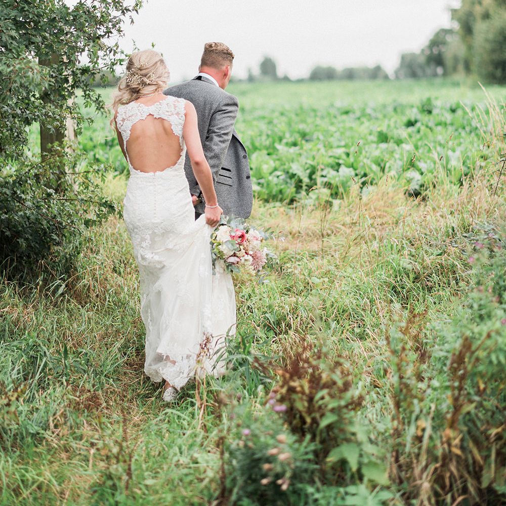 Bride in Lace Enzoani 'Inaru' Bridal Gown | Groom in Grey Wool Master Debonair Suit | Peach & Coral Country Wedding at Crabbs Barn, Essex | Kathryn Hopkins Photography | Film by Colbridge Media Services Ltd