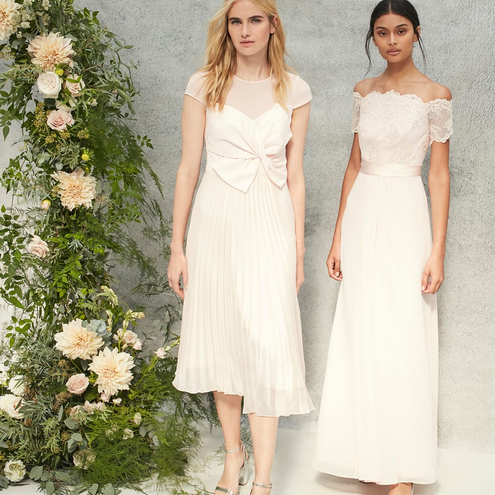 <a href="https://www.coast stores.com/p/bonnie bow dress/1902865?utm_source=Rock_my_wedding&utm_medium=social&utm_campaign=blog_post&utm_content=bonniedress" rel="noopener" target="_blank">Bonnie Bow Dress</a> & <a href="https://www.coast stores.com/p/madelene dress/1897065?utm_source=Rock_my_wedding&utm_medium=social&utm_campaign=blog_post&utm_content=madelenedress2" rel="noopener" target="_blank">Madelene Dress</a> by Coast