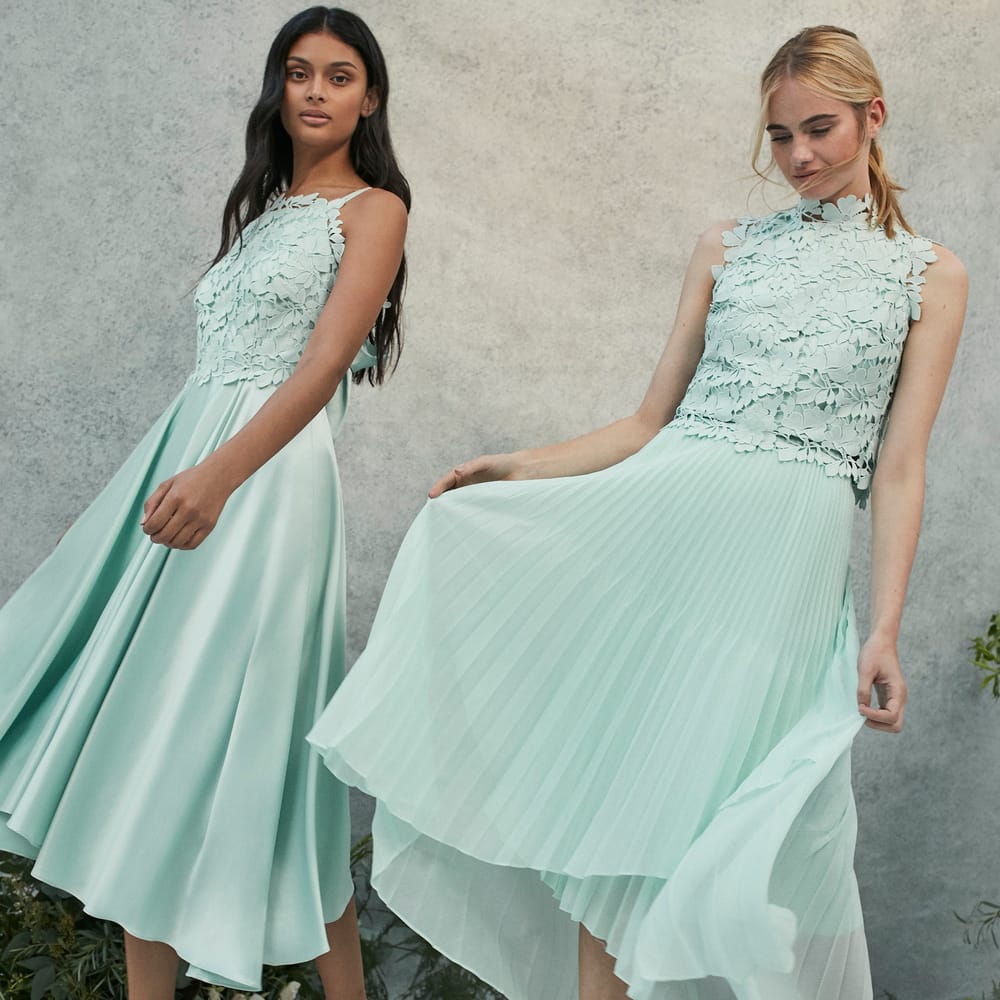 <a href="https://www.coast stores.com/p/janie lace midi dress/1875165?utm_source=Rock_my_wedding&utm_medium=social&utm_campaign=blog_post&utm_content=janiedress" rel="noopener" target="_blank">Janie Lace Dress</a>, <a href="https://www.coast stores.com/p/izel lace top/1875252?utm_source=Rock_my_wedding&utm_medium=social&utm_campaign=blog_post&utm_content=izeltop" rel="noopener" target="_blank">Izel Lace Top</a> & <a href="https://www.coast stores.com/p/amelia bridesmaid skirt/1902652?utm_source=Rock_my_wedding&utm_medium=social&utm_campaign=blog_post&utm_content=ameliaskirt" rel="noopener" target="_blank">Amelia Skirt</a> by Coast