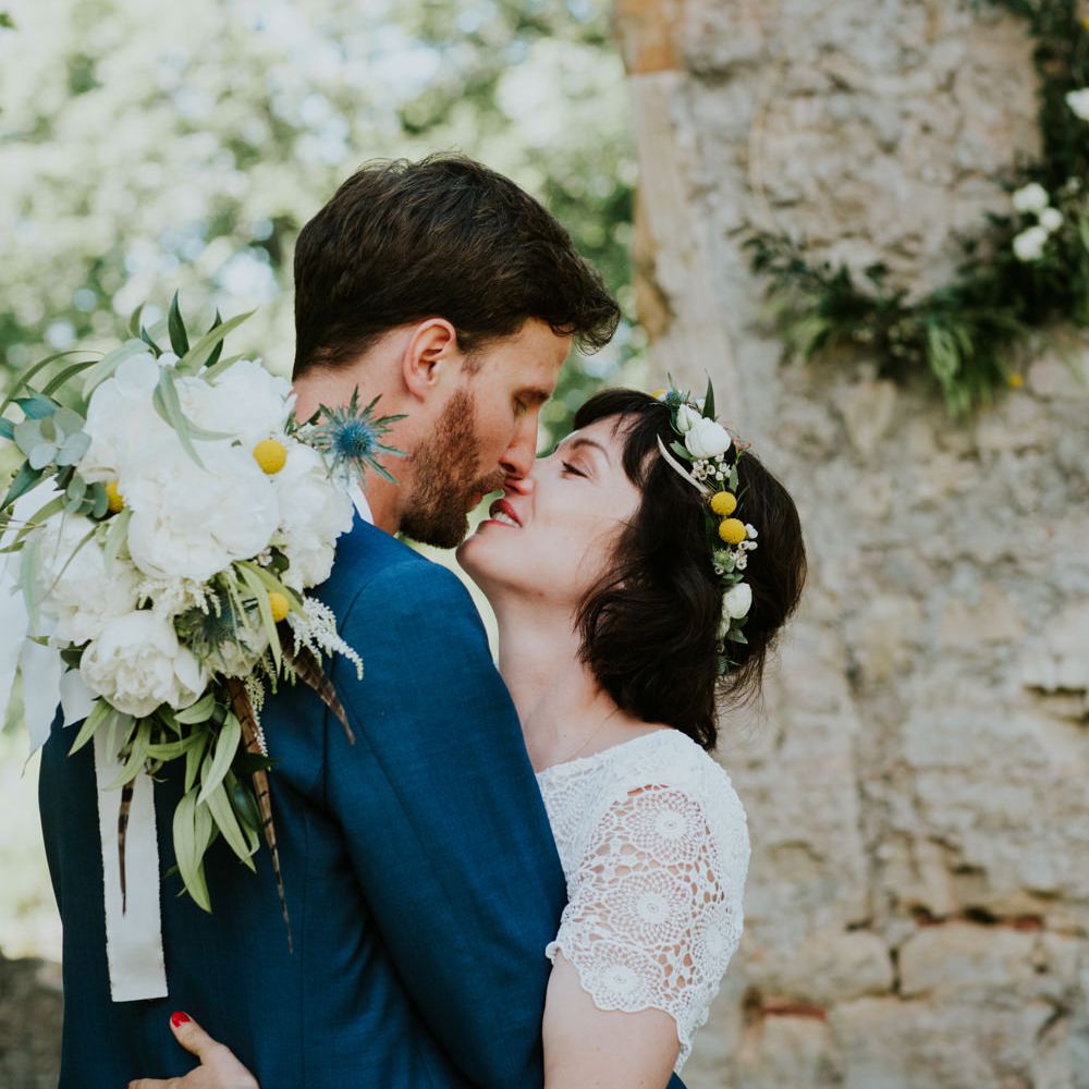 Boho Bride in Bespoke Lace Bridal Separates | Groom in Blue Suit | Chic Rustic French Wedding at Le Morimont Styled by Féelicité | Photography by Chloe