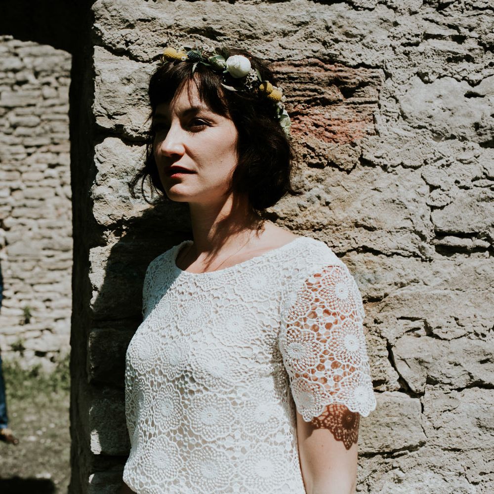 Boho Bride in Bespoke Lace Bridal Separates | Groom in Blue Suit | Chic Rustic French Wedding at Le Morimont Styled by Féelicité | Photography by Chloe
