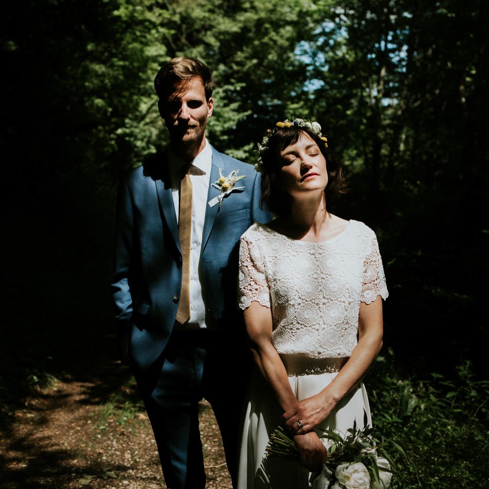 Boho Bride in Bespoke Lace Bridal Separates | Groom in Blue Suit | Chic Rustic French Wedding at Le Morimont Styled by Féelicité | Photography by Chloe