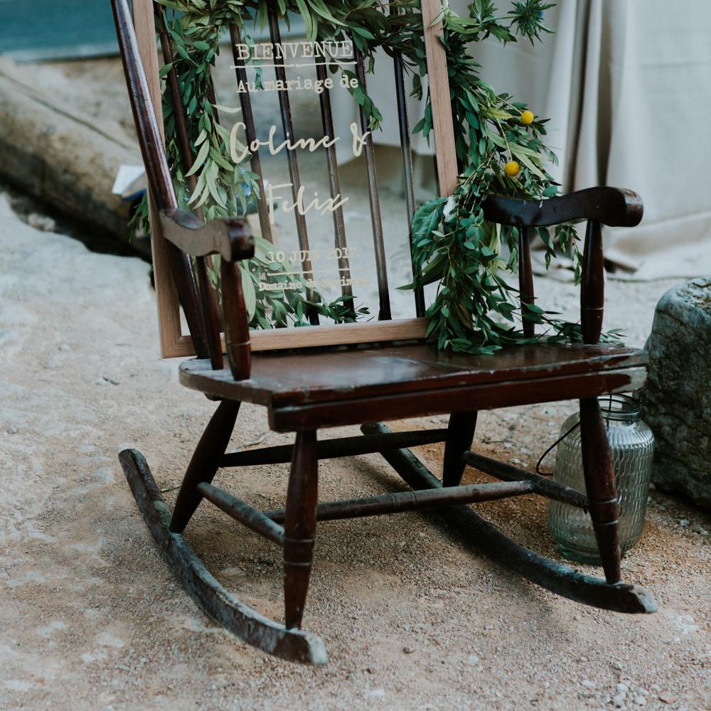 Wooden Rocking Chair & Glass Frame Wedding Sign | Chic Rustic French Wedding at Le Morimont Styled by Féelicité | Photography by Chloe