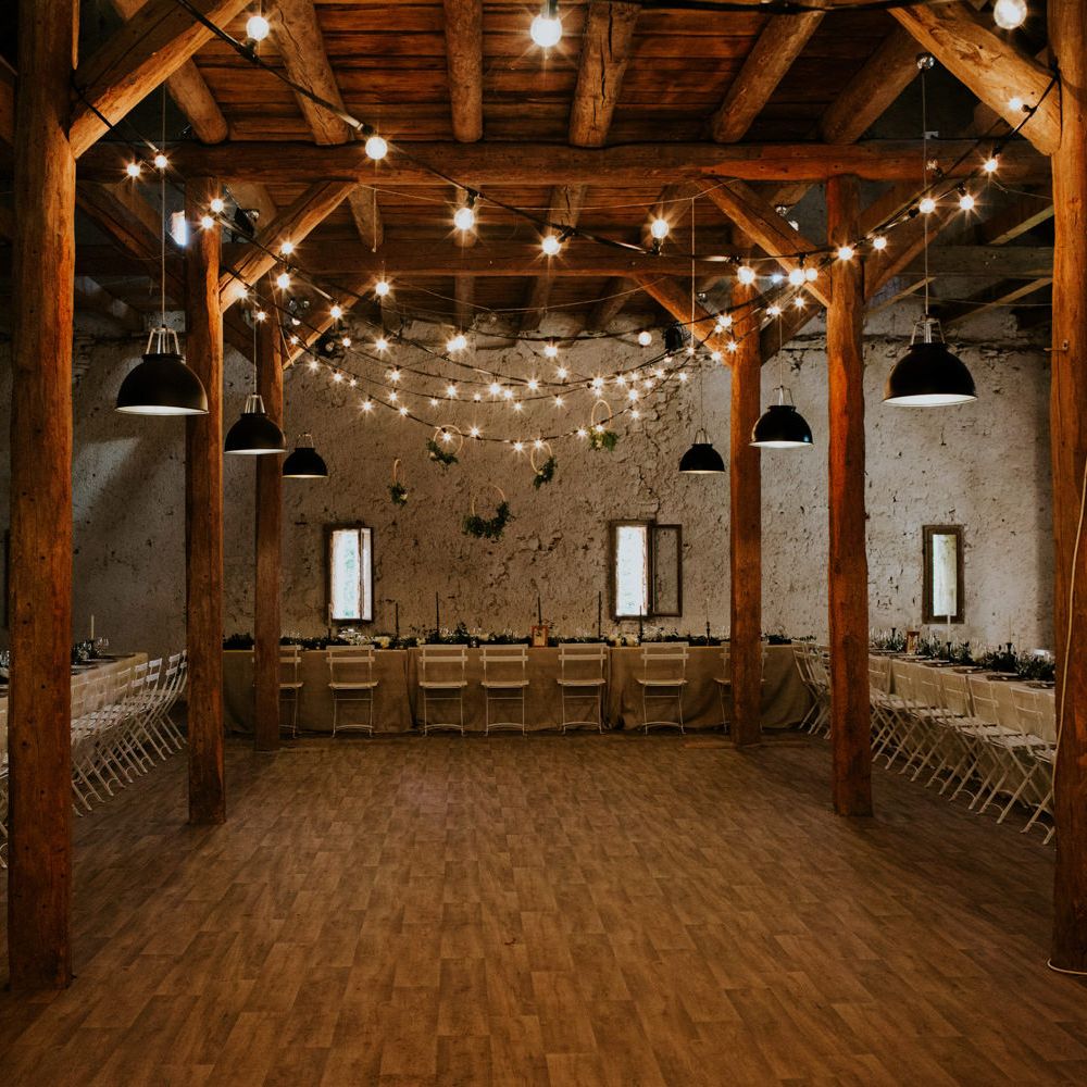 Festoon Light Dance Floor | Chic Rustic French Wedding at Le Morimont Styled by Féelicité | Photography by Chloe