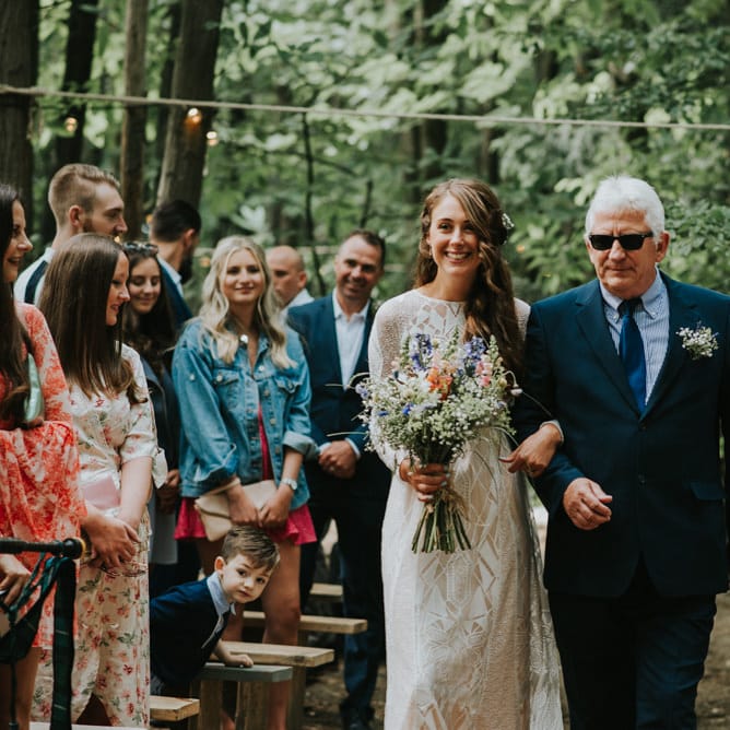 Wedding Ceremony | Bridal Entrance in Grace Loves Lace Gown | Outdoor Woodland Wedding at The Dreys in Kent | Fern Edwards Photography